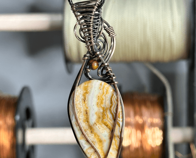 Crazy lace Agate pure copper wrapped pendant 