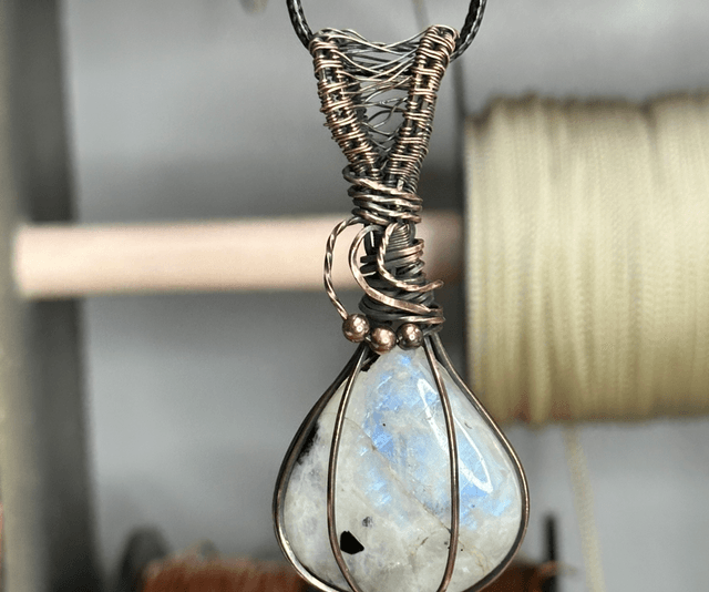 Rainbow moonstone wrapped in pure copper pendant 