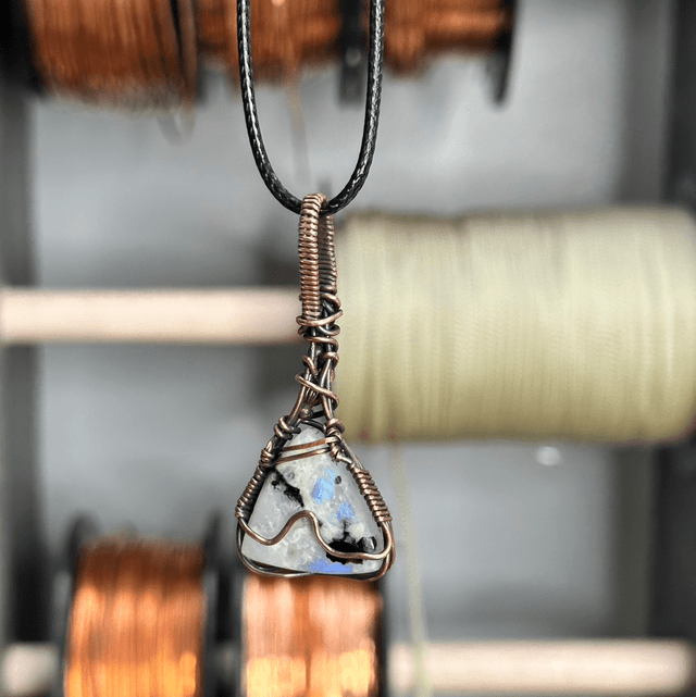 Rainbow moonstone wrapped in pure copper pendant 