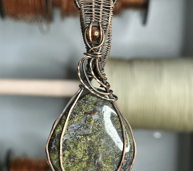 Dragons blood Jasper wrapped in pure copper pendant 