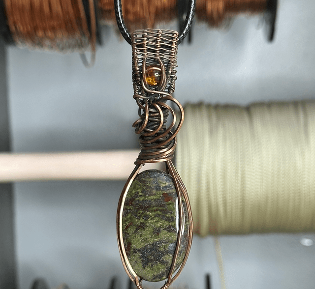 Dragons blood Jasper pure copper wrapped pendant 