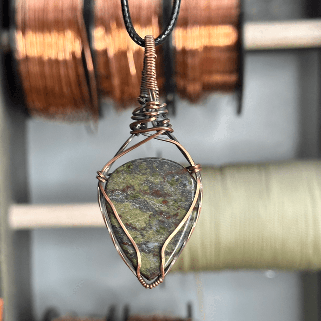Dragons blood Jasper pure copper wrapped pendant 