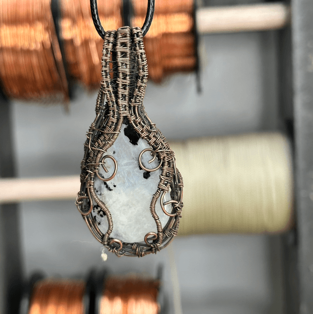 Rainbow moonstone wrapped in pure copper pendant 