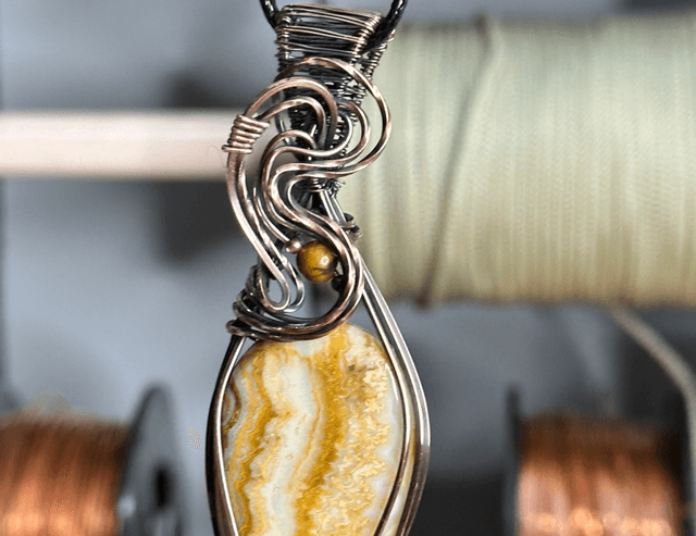 Crazy lace Agate pure copper wrapped pendant 