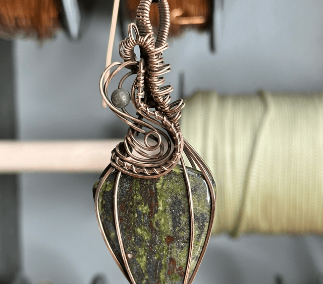 Dragons blood jasper pure copper wrapped pendant 