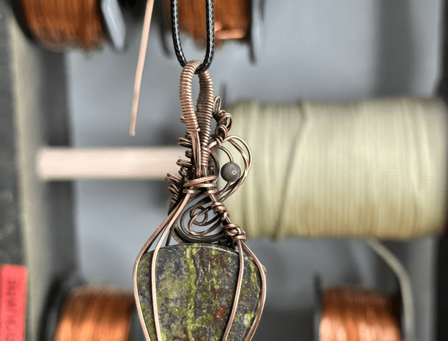 Dragons blood jasper pure copper wrapped pendant 