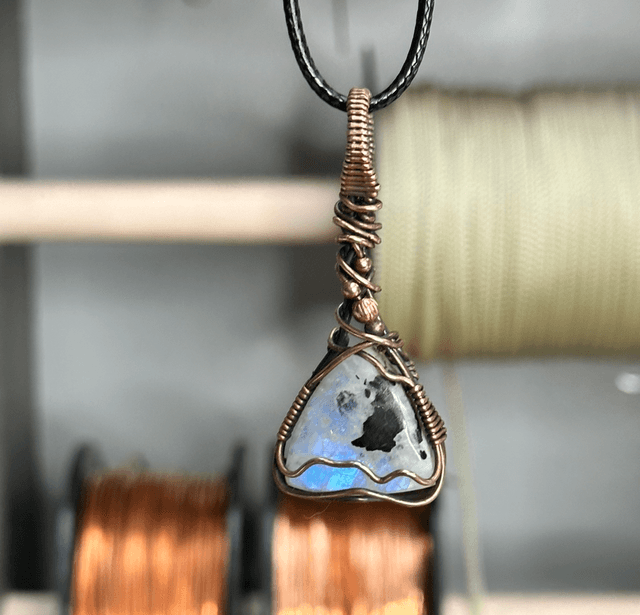 Rainbow moonstone wrapped in pure copper pendant 
