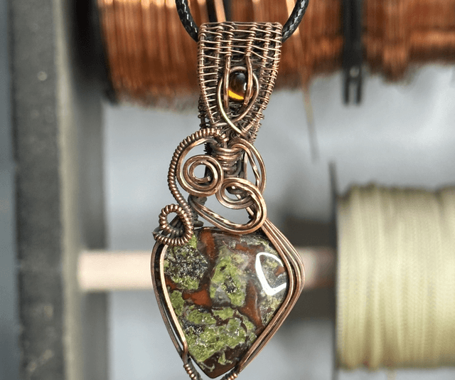 Dragons blood Jasper pure copper wrapped pendant 