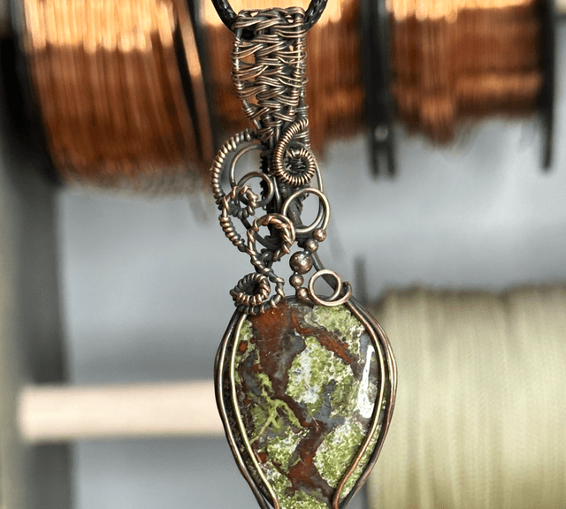 Dragons blood Jasper pure copper wrapped pendant 