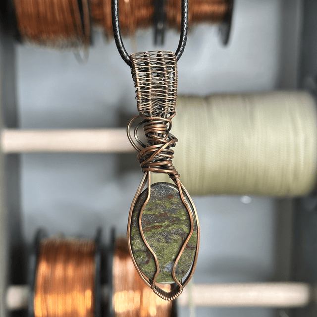 Dragons blood Jasper pure copper wrapped pendant 