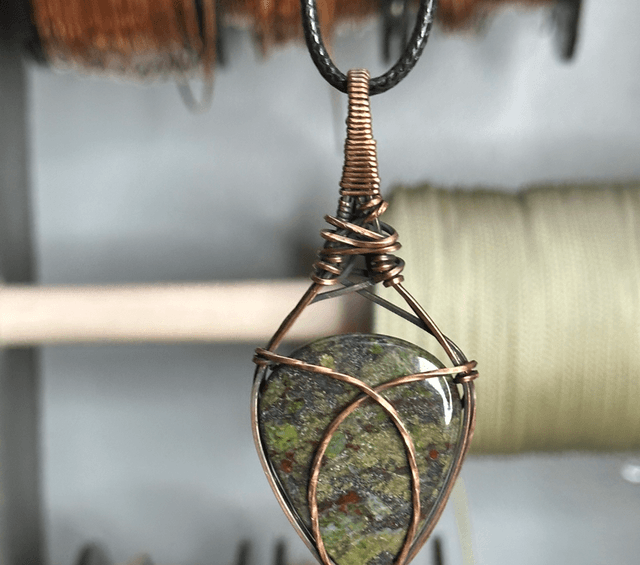 Dragons blood Jasper pure copper wrapped pendant 