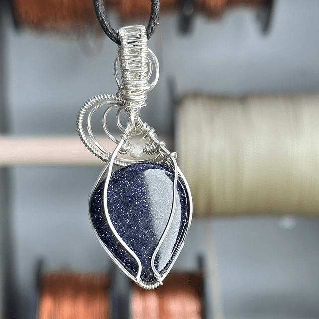 Blue goldstone 925 silver wrapped pendant 