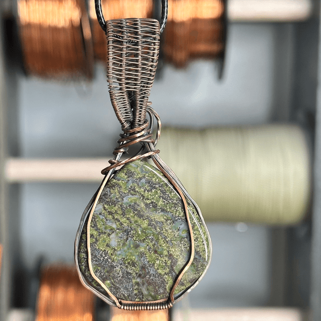 Dragons blood Jasper wrapped in pure copper pendant 