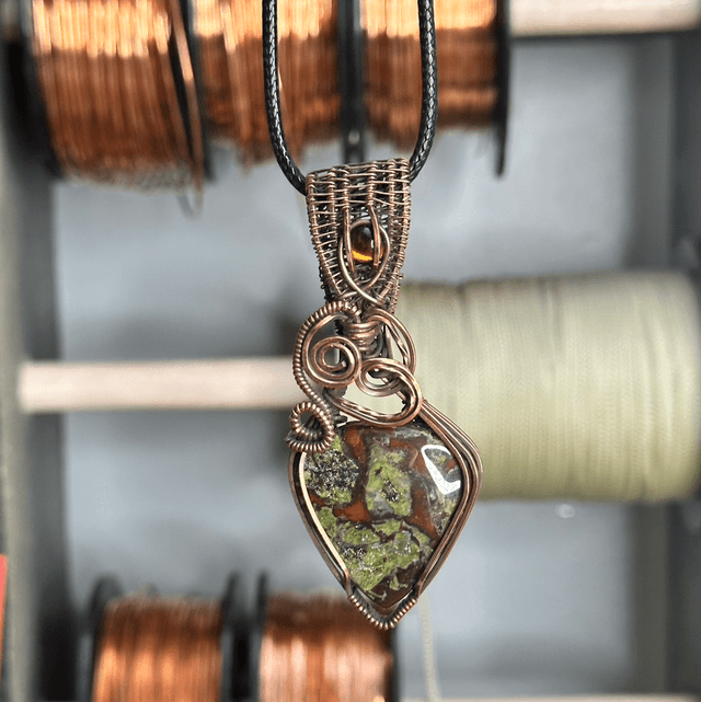 Dragons blood Jasper pure copper wrapped pendant 